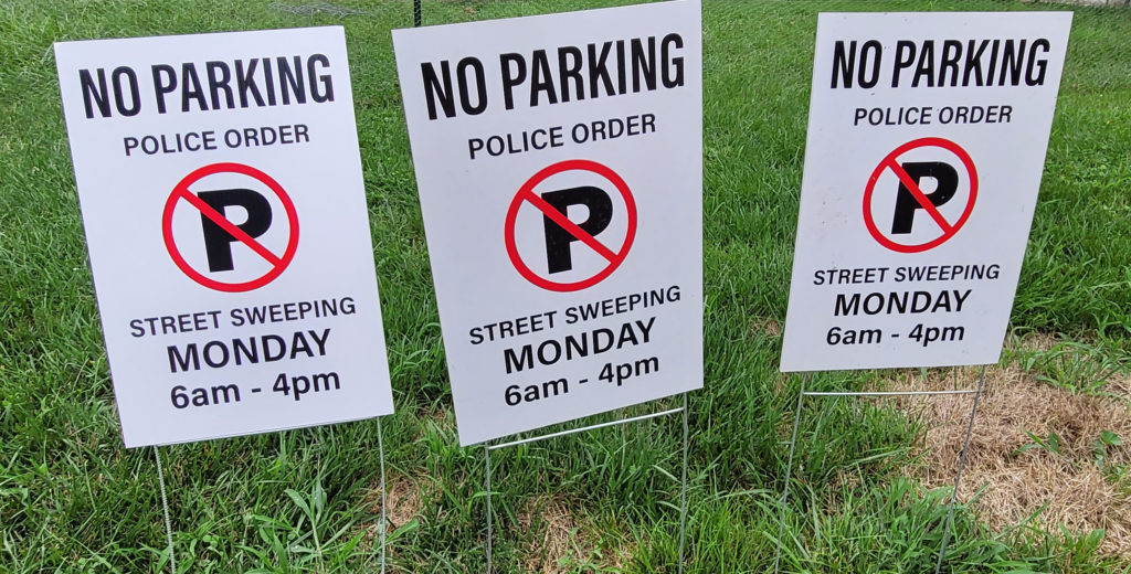 Signs collected in a neighborhood after they were abandoned in July of 2022.